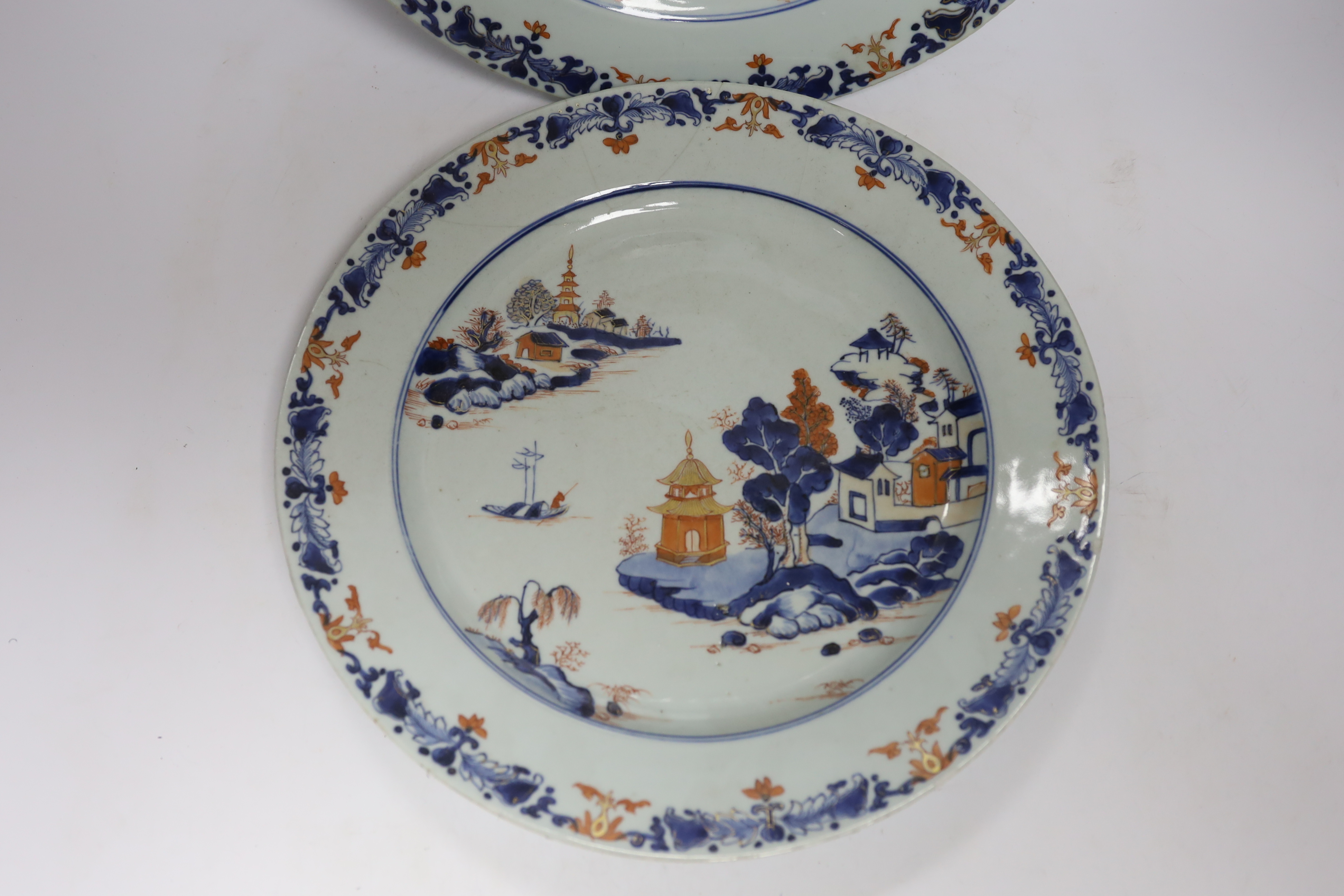 A pair of Chinese Imari landscape dishes, Qianlong period, 35cm diameter